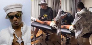 Wizkid gets another tattoo on his leg 