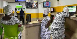 Mixed reactions as Nigerians woman spotted crying in Bet9ja shop